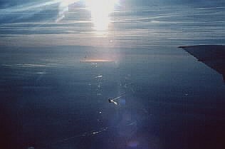 Reflected versus direct rays, seen from airplane.